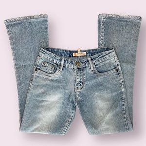 early 2000s faded denim low rise distressed bootcut jeans
